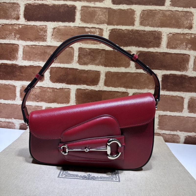 G*u*i top handle bags